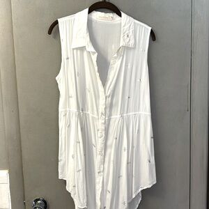 White sleeveless top with dragonflies